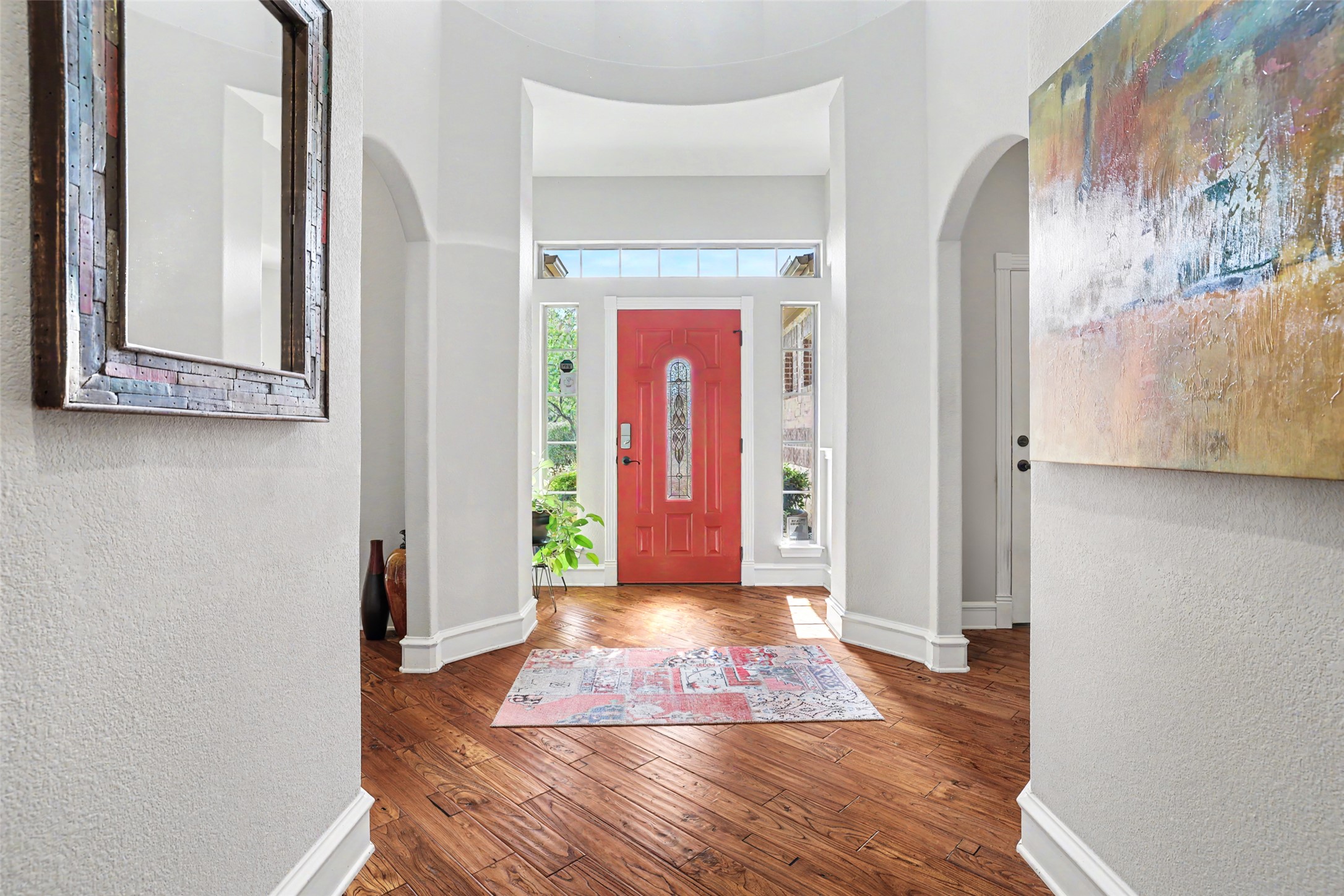 805 Boquilla Trail Georgetown, TX 78633 - Photo 3 of 40 a view of a hallway with wooden floor and entryway