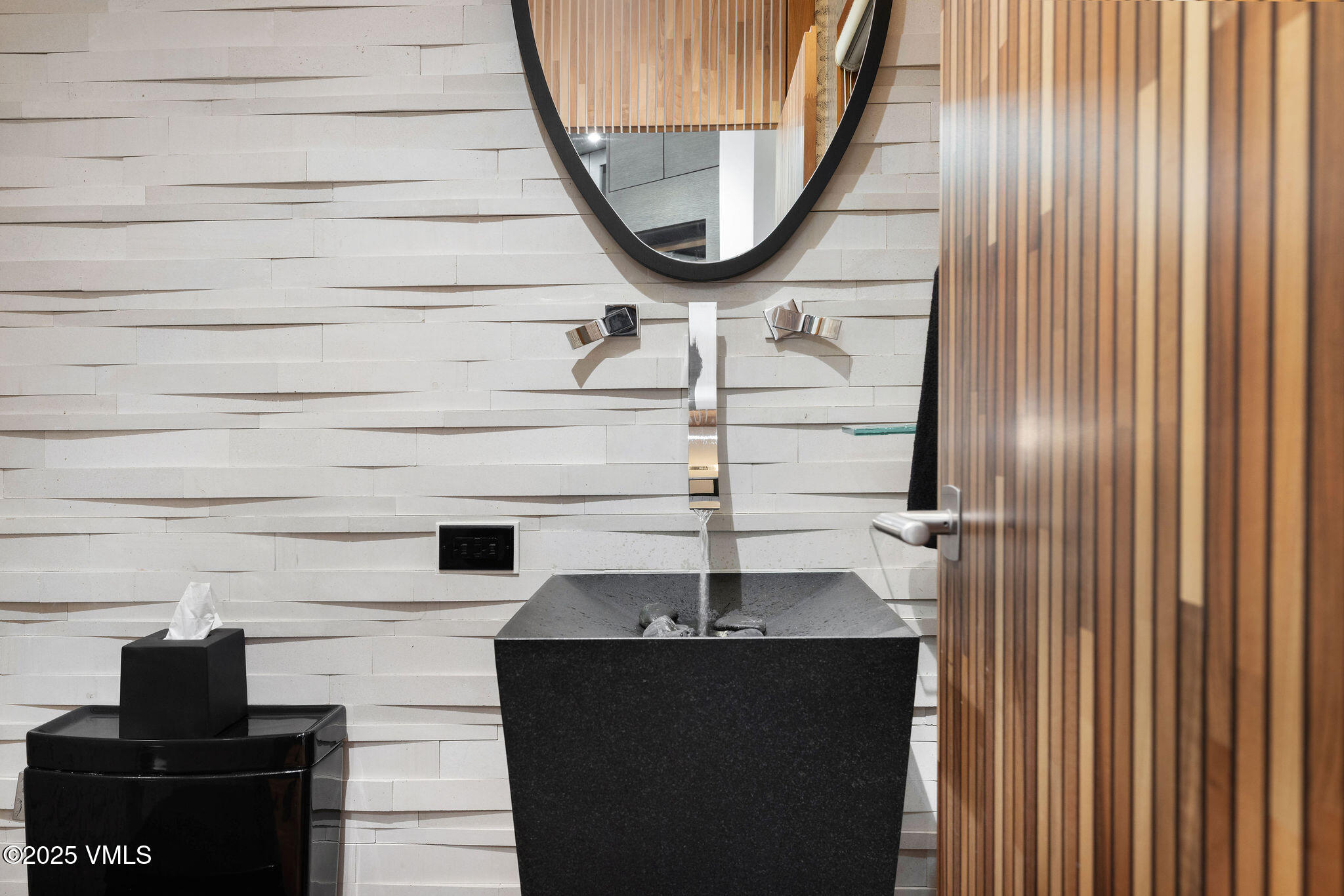 126 West Forest Road, Unit W Vail, CO 81657 - Photo 15 of 40 a bathroom with a sink and a mirror