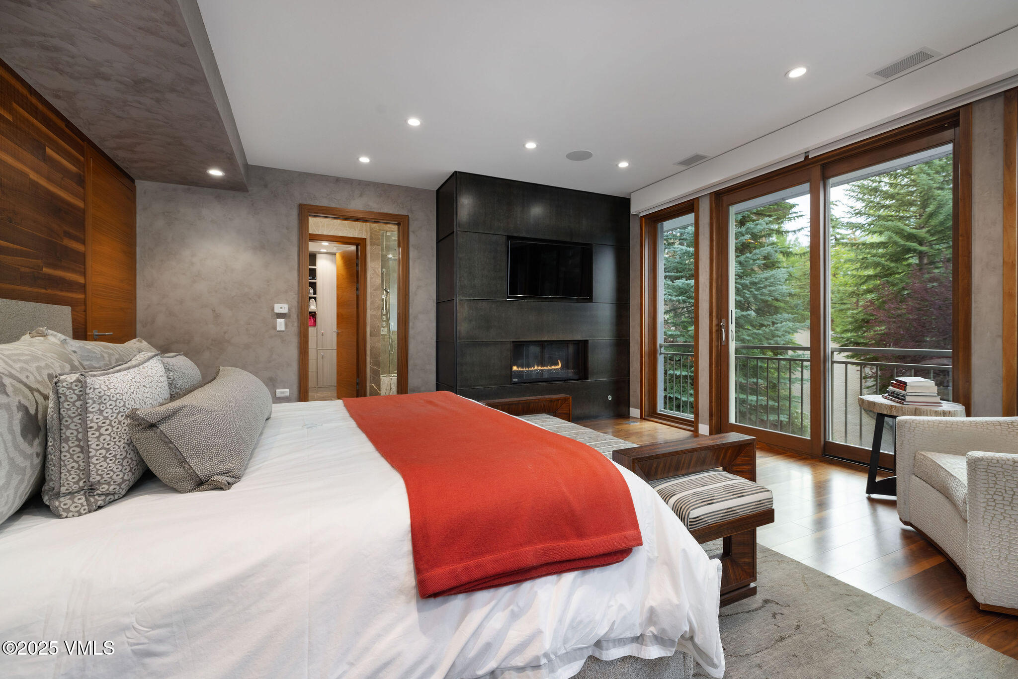 126 West Forest Road, Unit W Vail, CO 81657 - Photo 18 of 40 a bedroom with a large bed and a large window