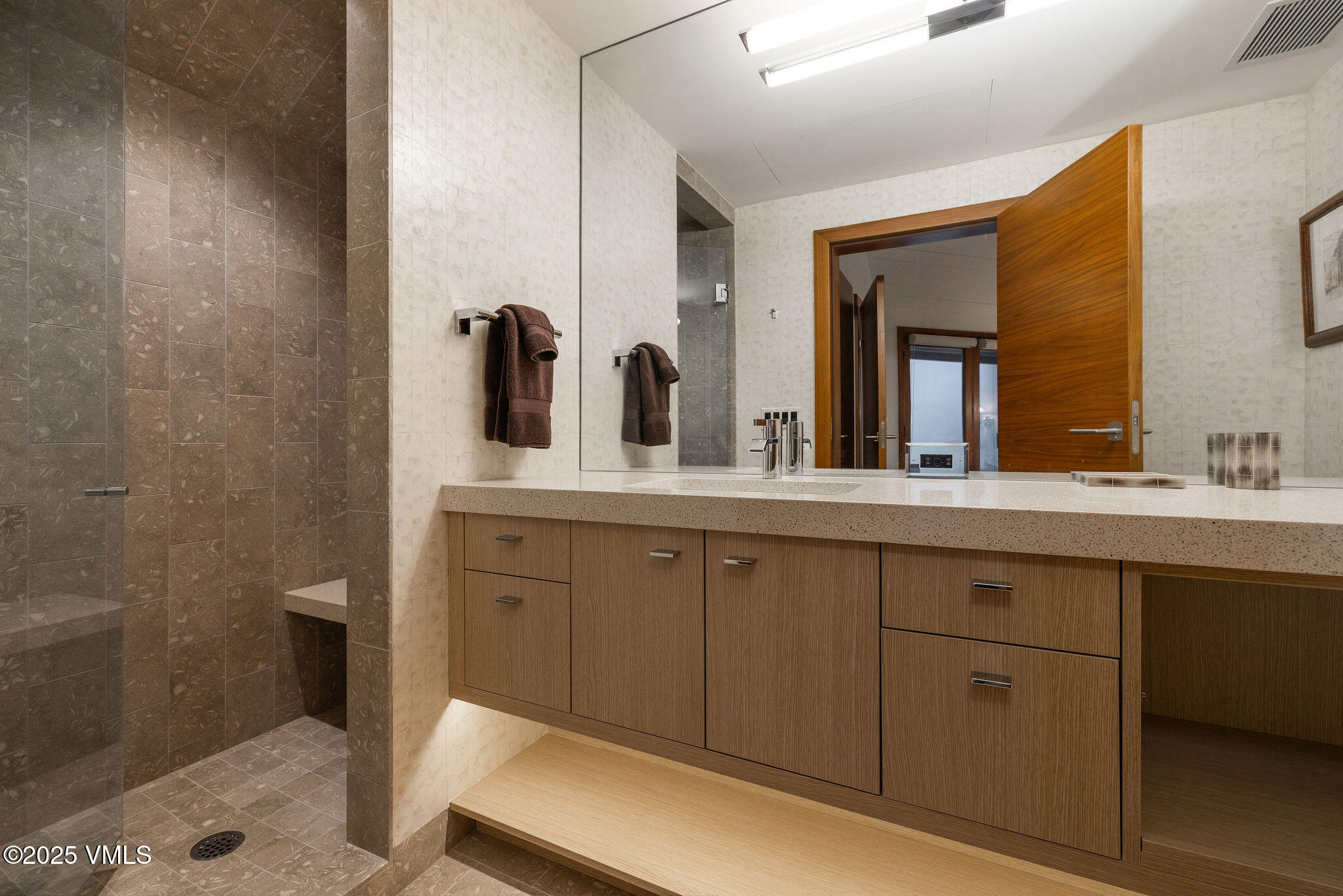 126 West Forest Road, Unit W Vail, CO 81657 - Photo 24 of 40 a spacious bathroom with a double vanity sink and a mirror