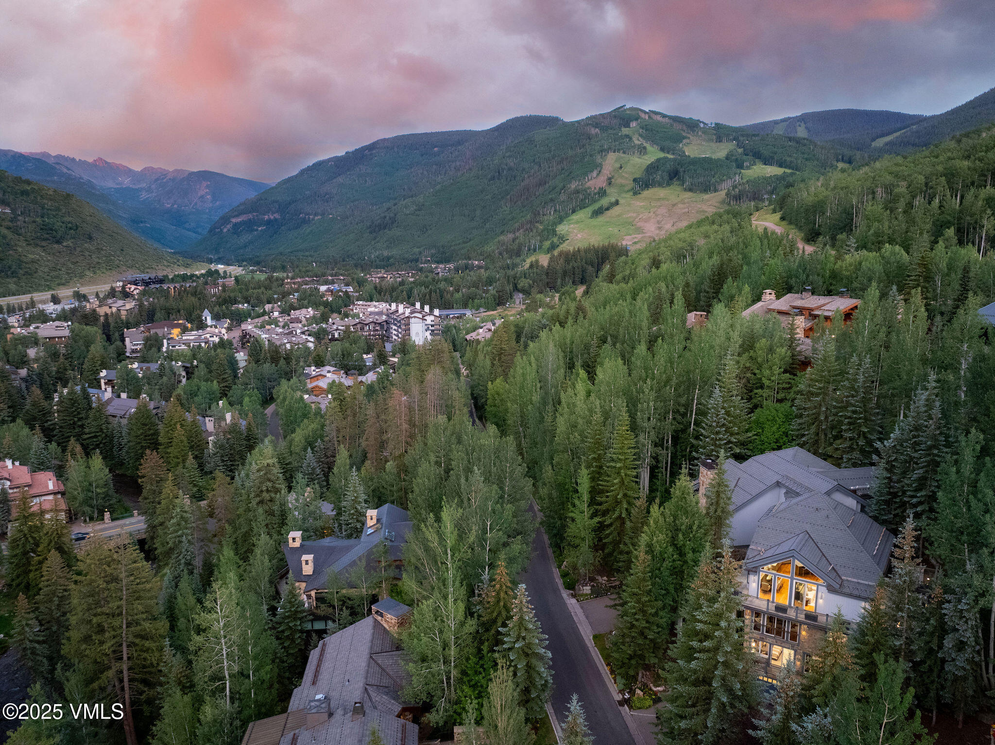 126 West Forest Road, Unit W Vail, CO 81657 - Photo 39 of 40 an aerial view of green landscape with trees houses and mountain view