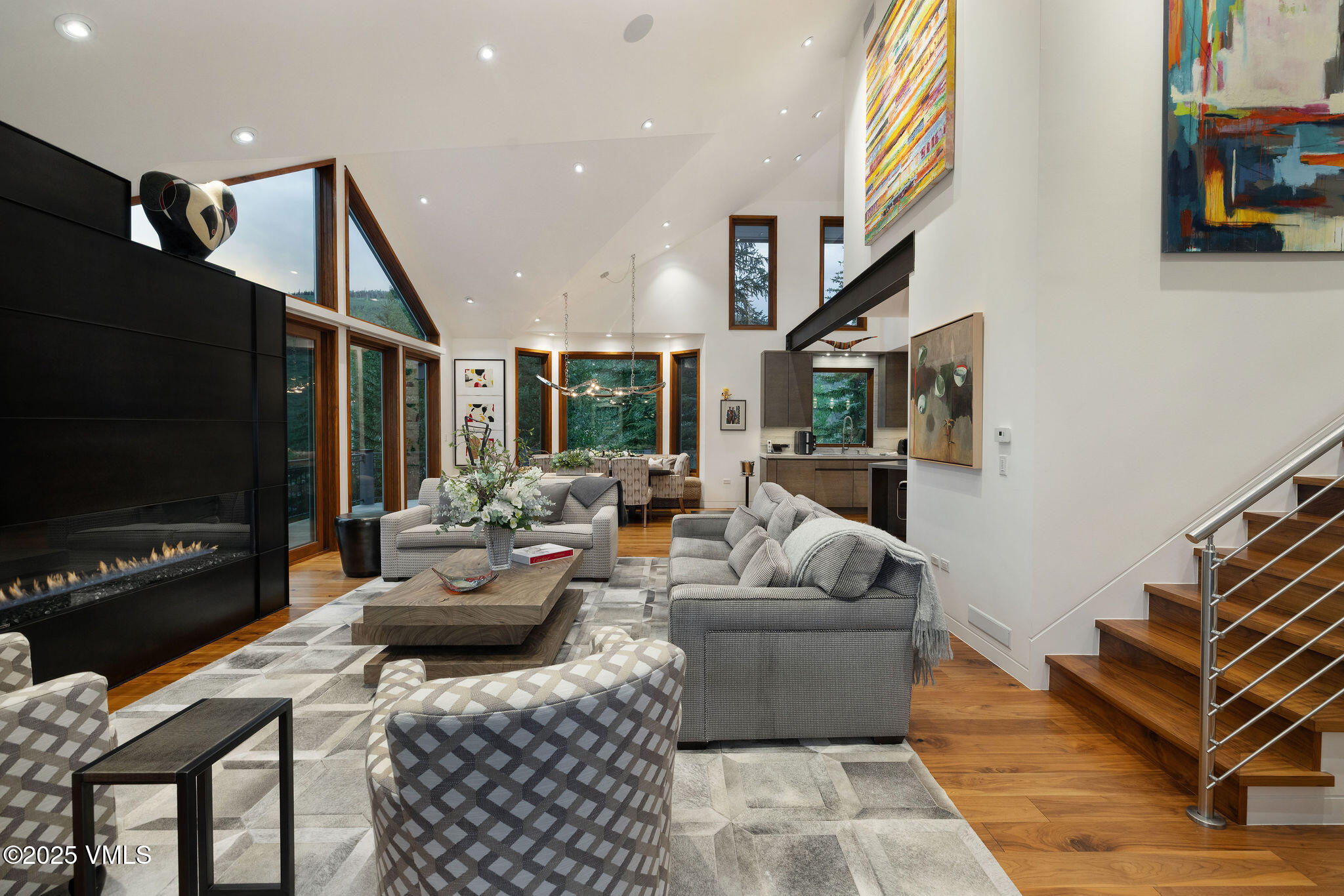 126 West Forest Road, Unit W Vail, CO 81657 - Photo 6 of 40 a living room with furniture and a flat screen tv