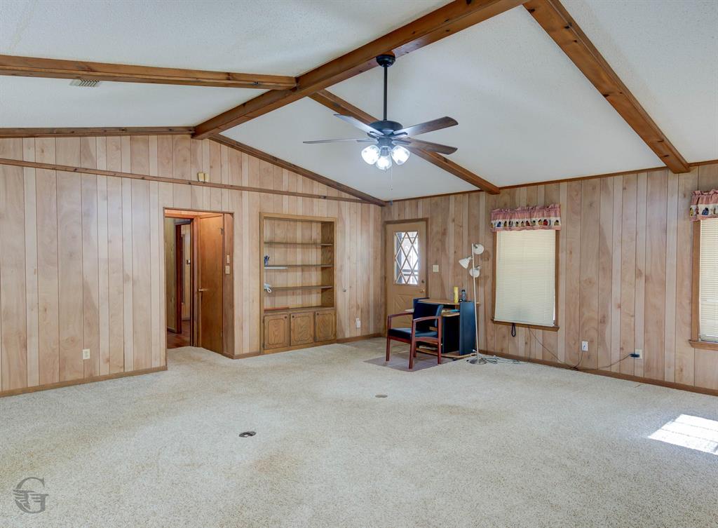 314 Dilly Road Mooringsport, LA 71060 - Photo 27 of 37 Built-in bookcase. Plenty of room for lots of furniture and guests