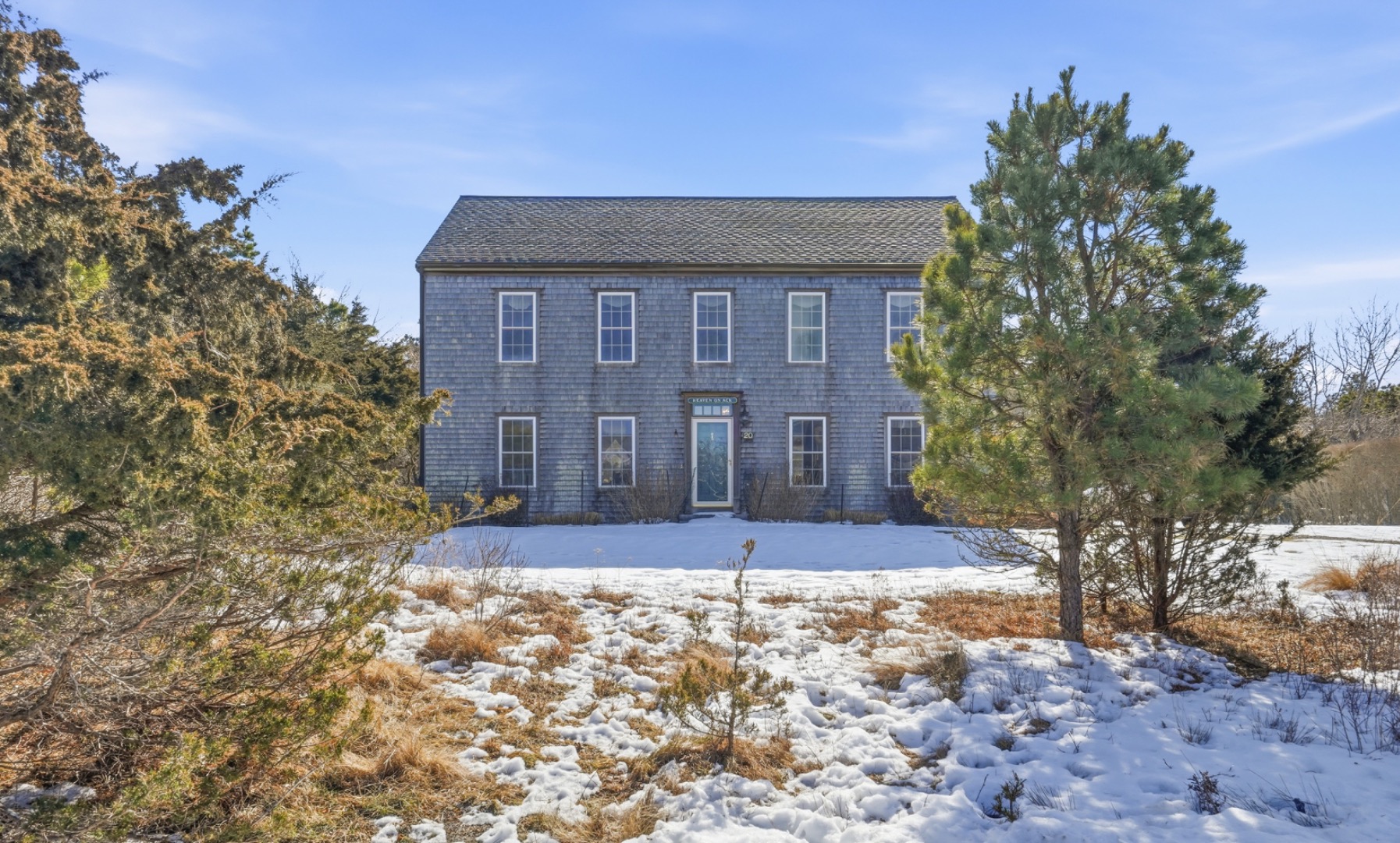 20 Rudder Lane Nantucket, MA 02554 - Photo 2 of 34 a view of a brick house with a yard