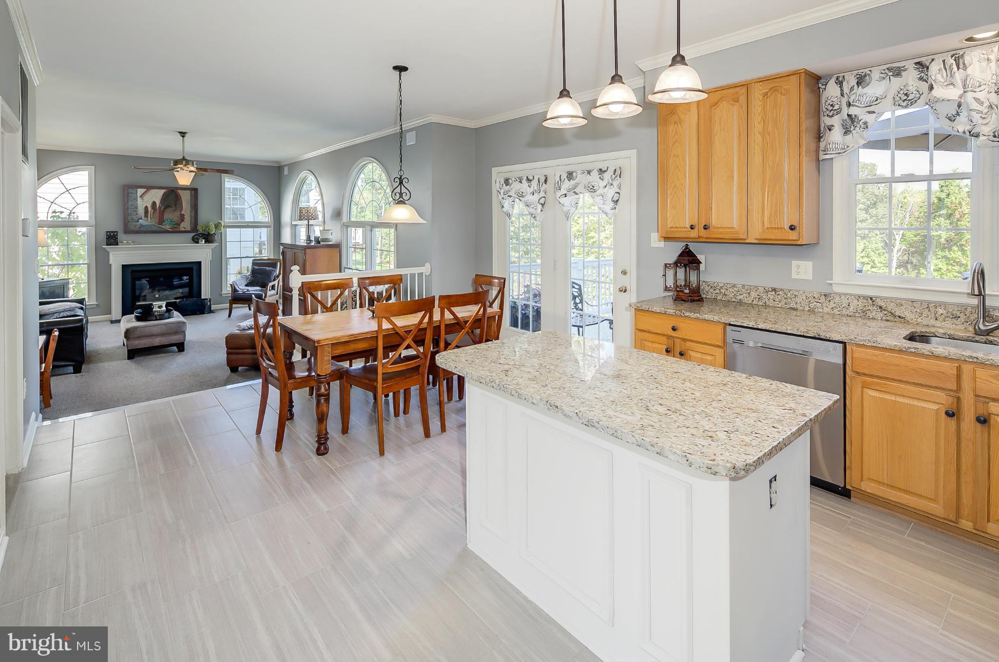 5949 Sandy Ridge Elkridge, MD 21075 - Photo 8 of 30 a view of a kitchen and dining table