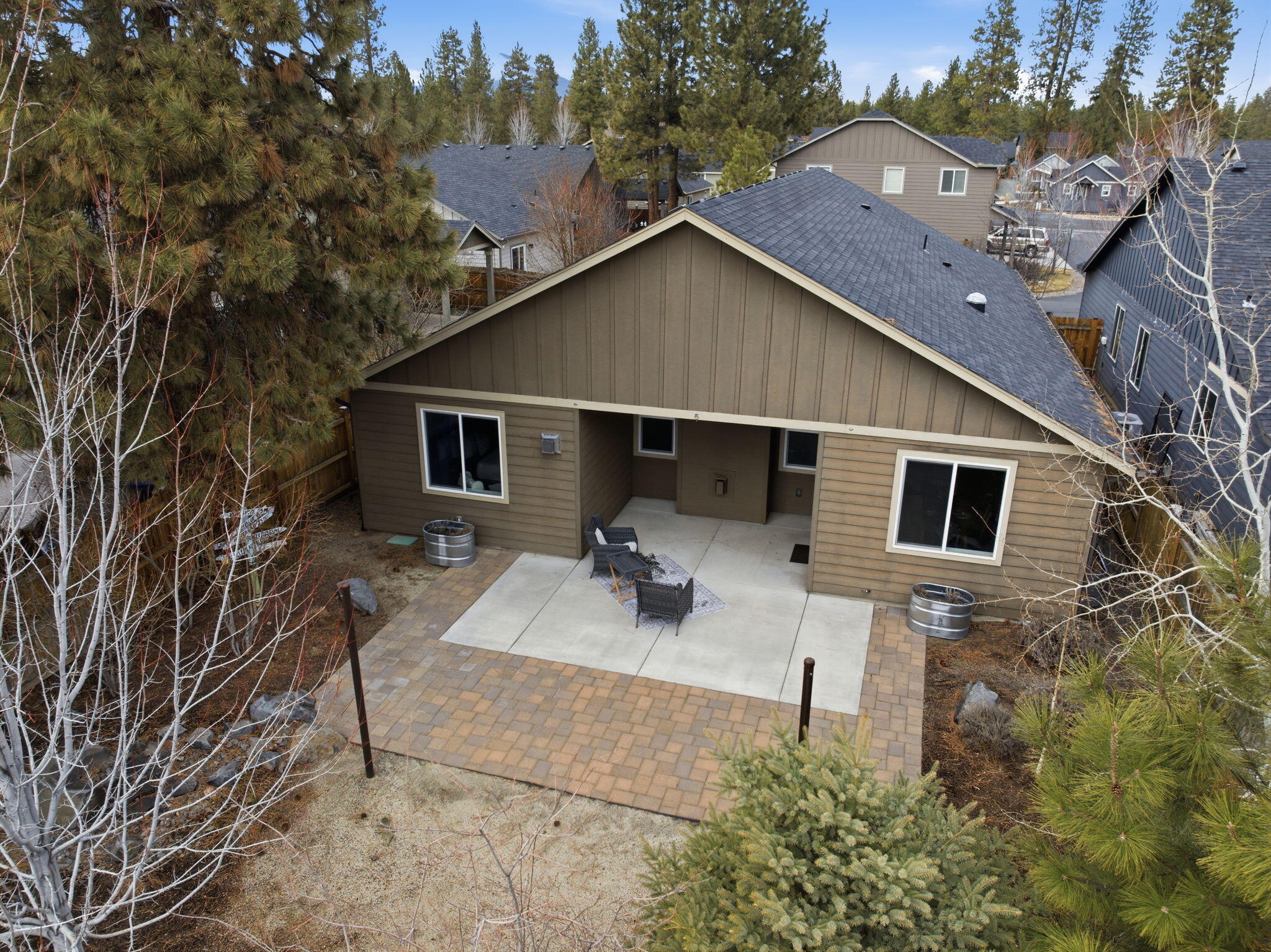 1255 McKinney Butte Road, Unit E Sisters, OR 97759 - Photo 36 of 43 Back Yard Paver Patio and Shade Sails