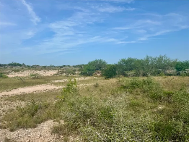 a view of lake with mountain in the background