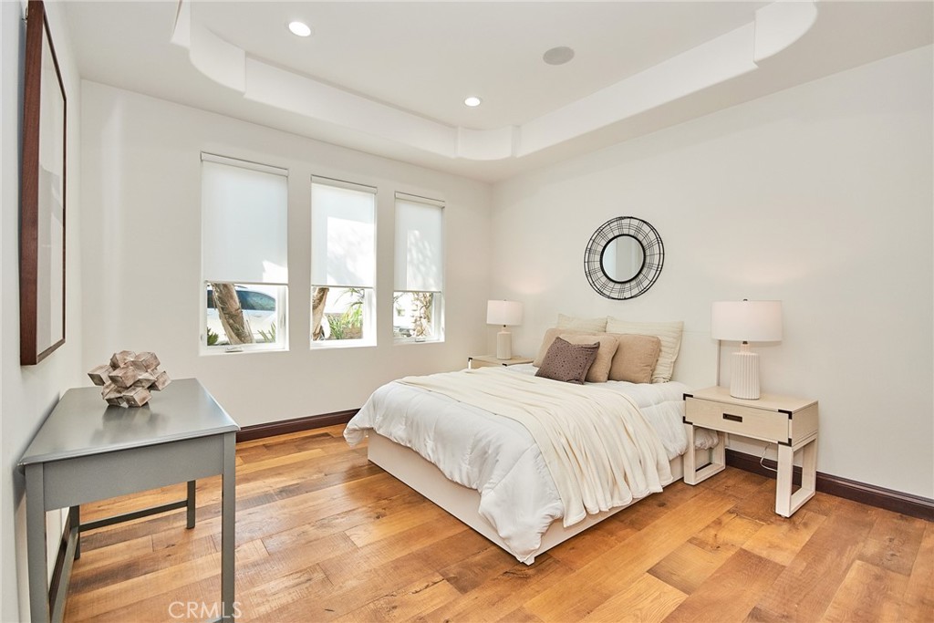 1051 Arroyo Drive Fullerton, CA 92833 - Photo 17 of 73 a bedroom with a bed and a table