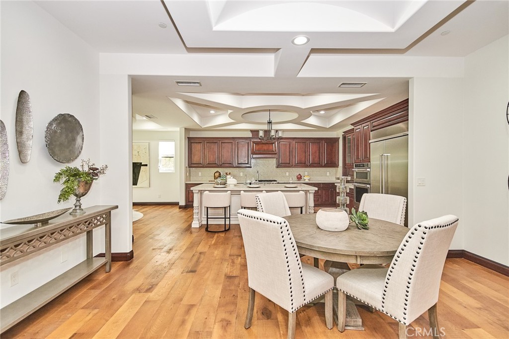 1051 Arroyo Drive Fullerton, CA 92833 - Photo 29 of 73 a dining room with furniture and wooden floor
