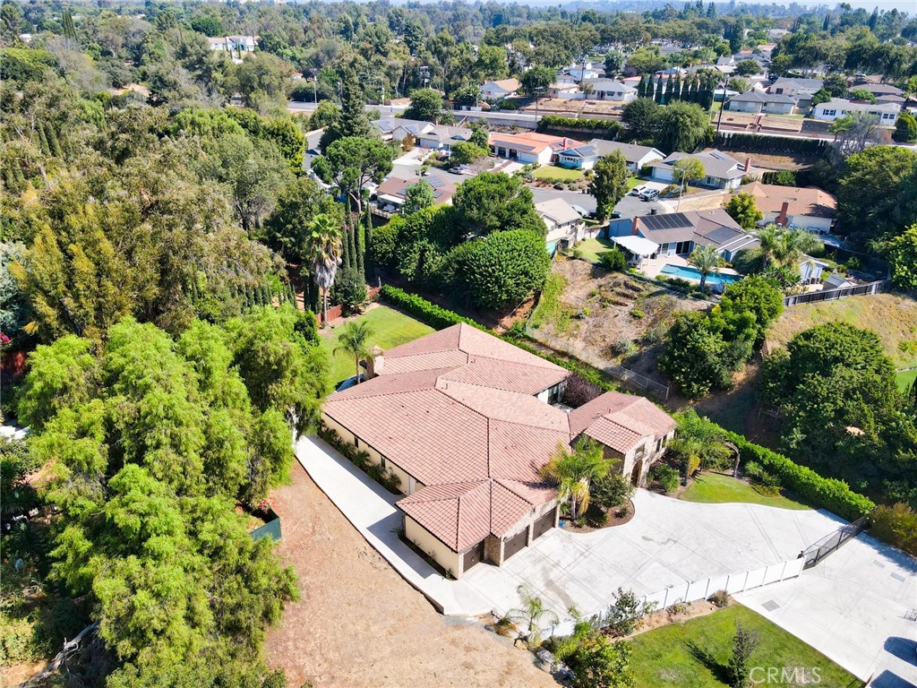 1051 Arroyo Drive Fullerton, CA 92833 - Photo 3 of 73 an aerial view of a house with a yard and lake view