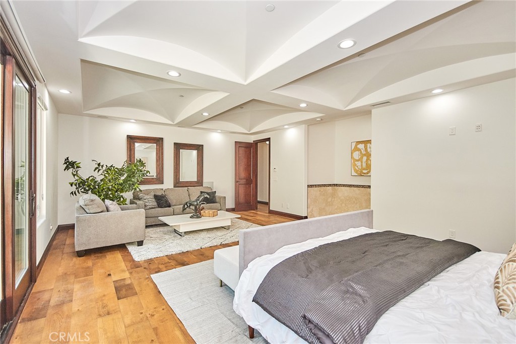 1051 Arroyo Drive Fullerton, CA 92833 - Photo 43 of 73 a bed room with a bed couch and a potted plant