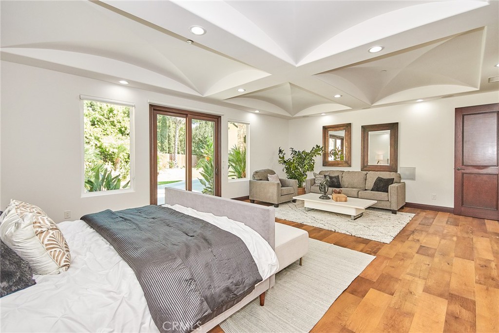 1051 Arroyo Drive Fullerton, CA 92833 - Photo 44 of 73 a spacious bedroom with a large bed and large windows