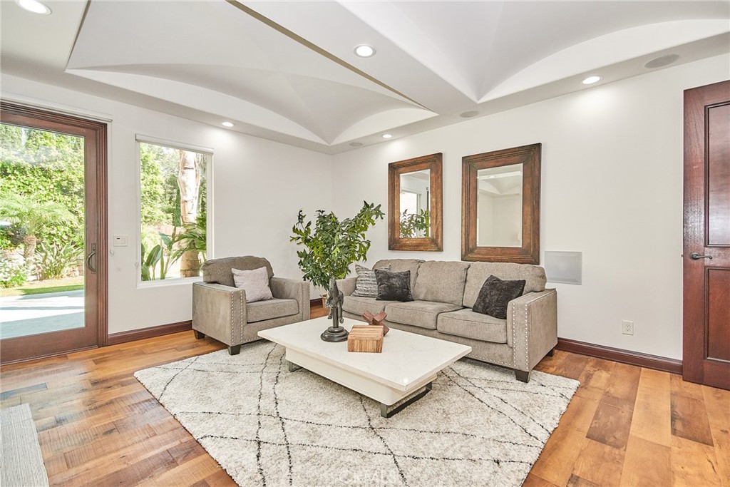 1051 Arroyo Drive Fullerton, CA 92833 - Photo 45 of 73 a living room with furniture and a rug