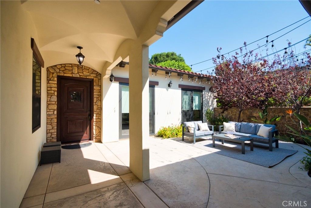 1051 Arroyo Drive Fullerton, CA 92833 - Photo 5 of 73 a view of a patio with couches and potted plants