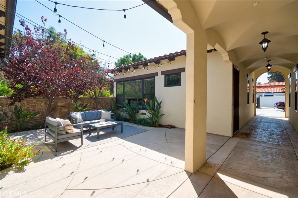 1051 Arroyo Drive Fullerton, CA 92833 - Photo 6 of 73 a view of a porch with furniture and a yard