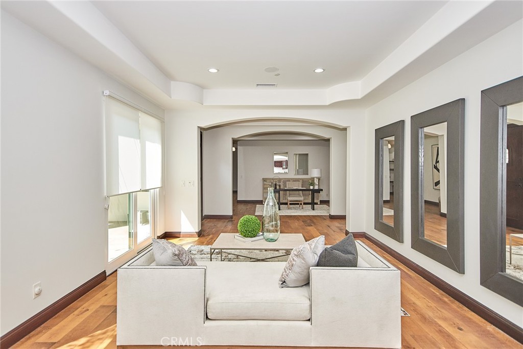 1051 Arroyo Drive Fullerton, CA 92833 - Photo 9 of 73 a living room with furniture and a large window