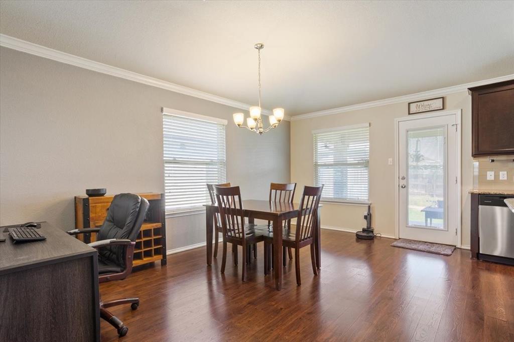 5308 Tama Drive Waco, TX 76708 - Photo 9 of 29 a view of a dining room with furniture window and wooden floor