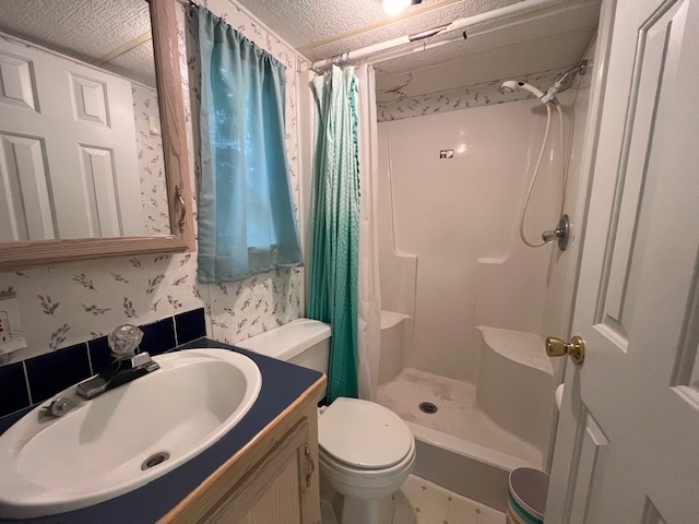 2795 East 28th Road Marseilles, IL 61341 - Photo 15 of 57 a bathroom with a sink toilet and shower