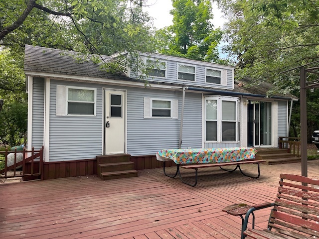 2795 East 28th Road Marseilles, IL 61341 - Photo 2 of 57 a backyard of a house with barbeque oven table and chairs