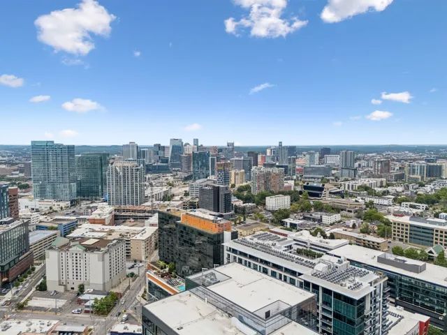 a view of city with tall buildings