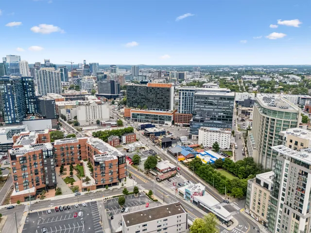 a view of a city with tall buildings