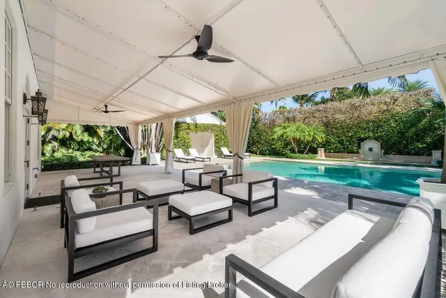 a outdoor living space with patio furniture and a garden