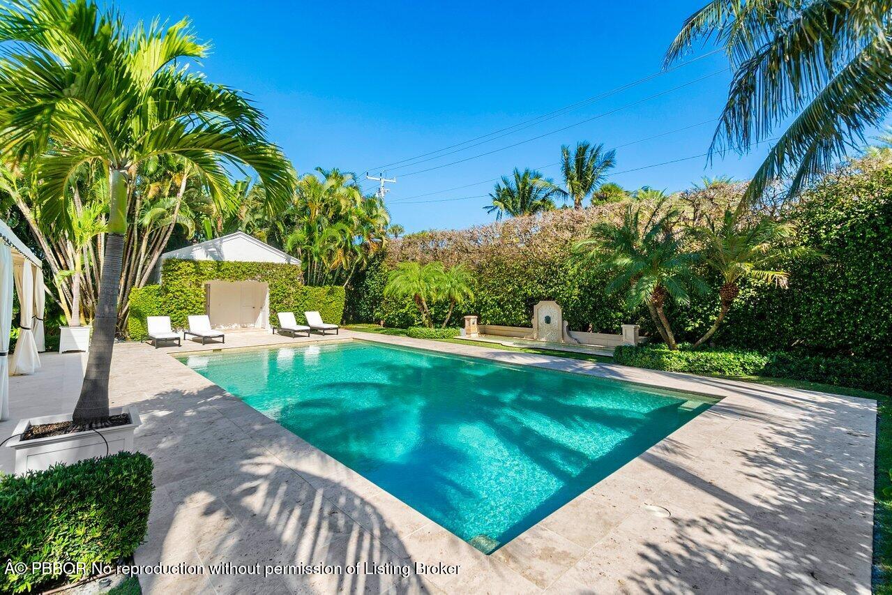 100 Regents Park Road Palm Beach, FL 33480 - Photo 34 of 42 a view of a backyard