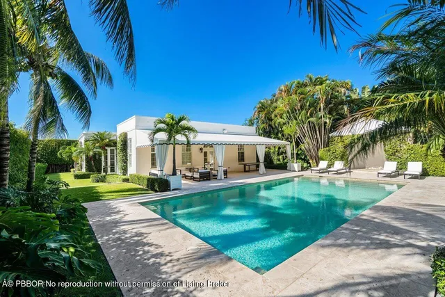 a view of a house with a swimming pool