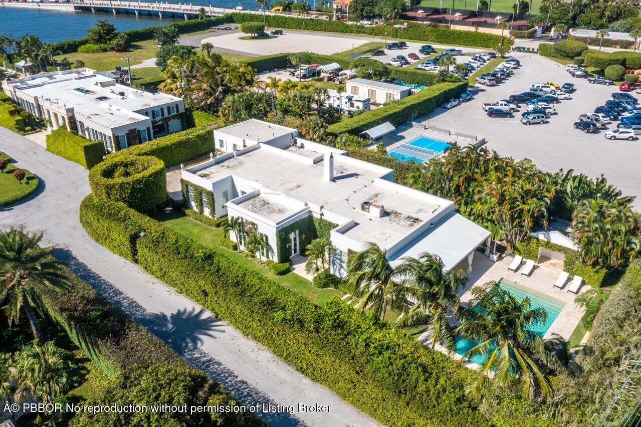 100 Regents Park Road Palm Beach, FL 33480 - Photo 40 of 42 an aerial view of residential houses with outdoor space
