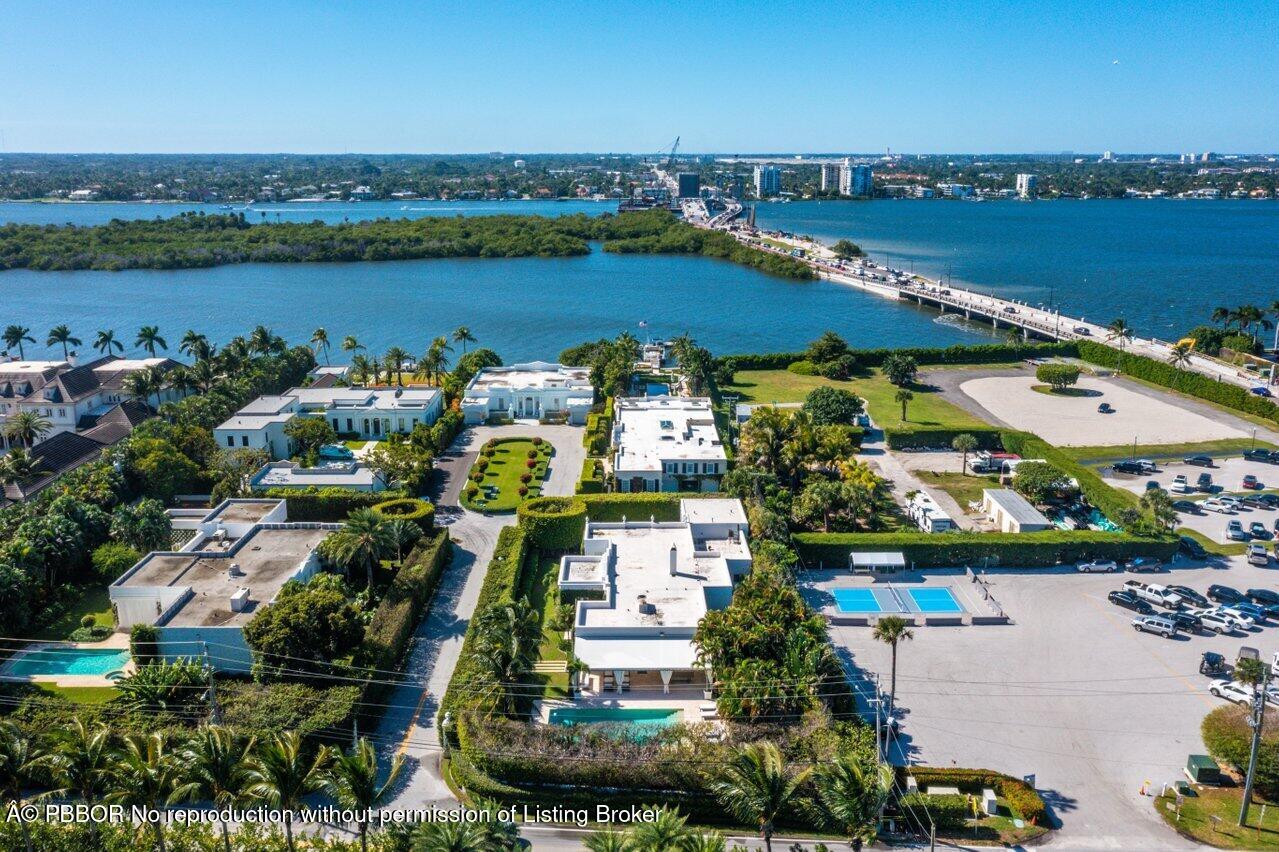 100 Regents Park Road Palm Beach, FL 33480 - Photo 41 of 42 an aerial view of a houses with outdoor space and lake view