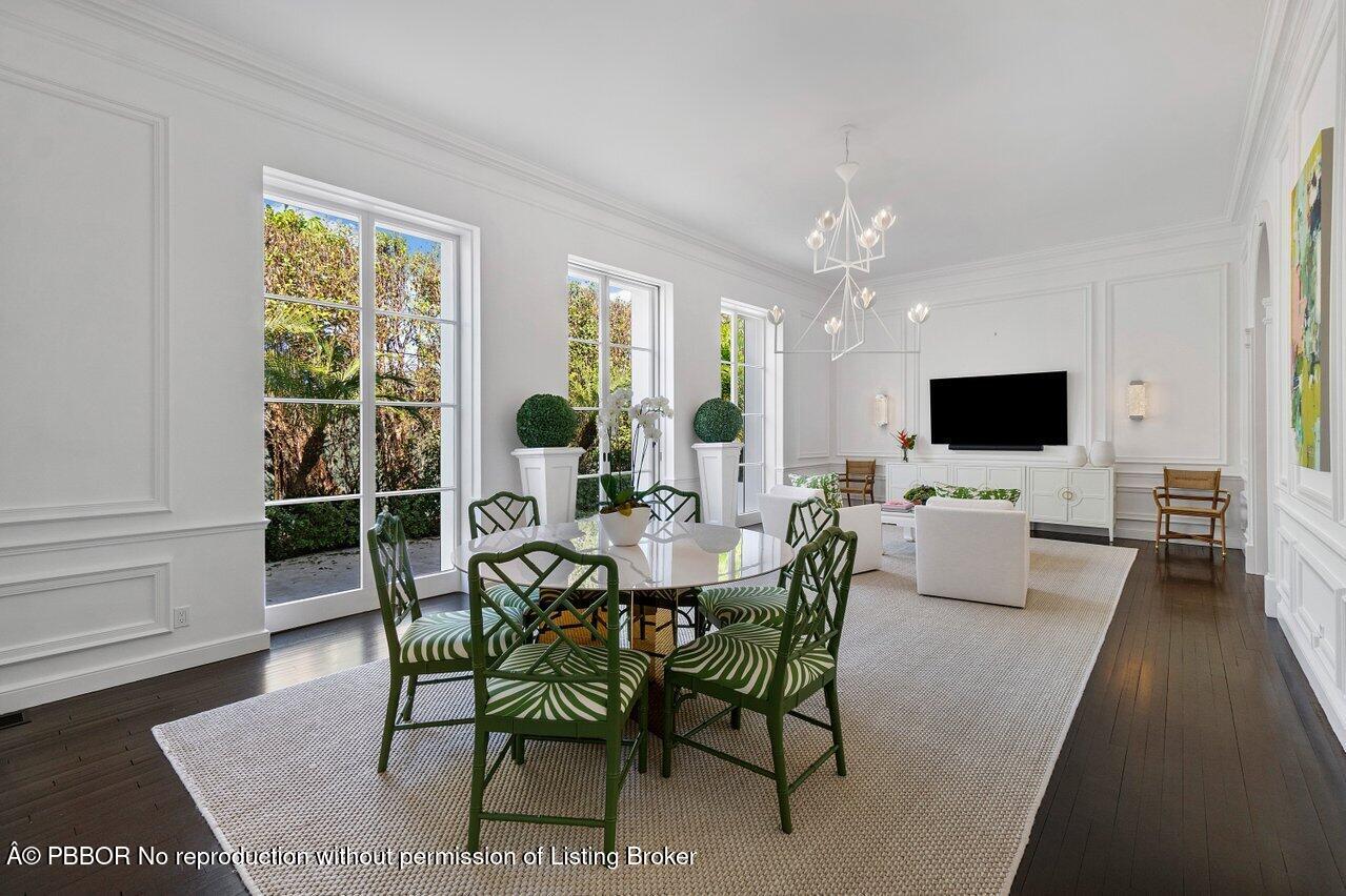 100 Regents Park Road Palm Beach, FL 33480 - Photo 7 of 42 a view of a dining room with furniture window and wooden floor