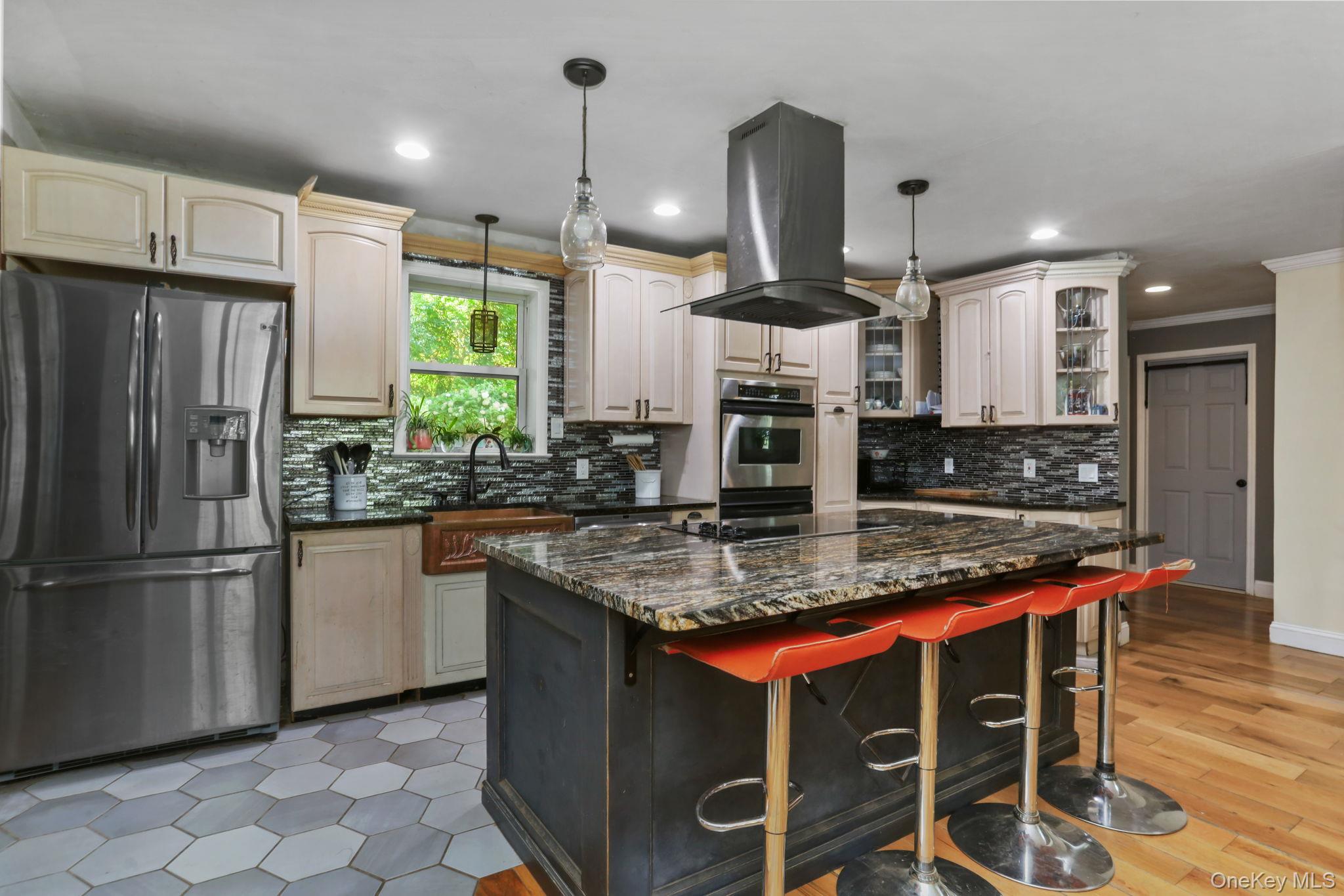487 Chestnut Ridge Road Dover Plains, NY 12522 - Photo 15 of 41 a kitchen with stainless steel appliances granite countertop a sink a stove and a refrigerator