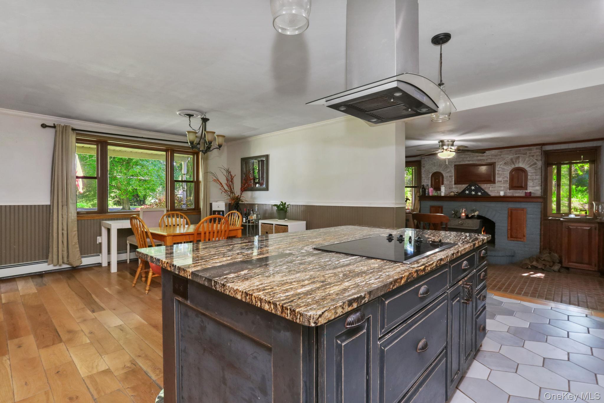 487 Chestnut Ridge Road Dover Plains, NY 12522 - Photo 18 of 41 a kitchen with granite countertop a sink a counter space and stainless steel appliances