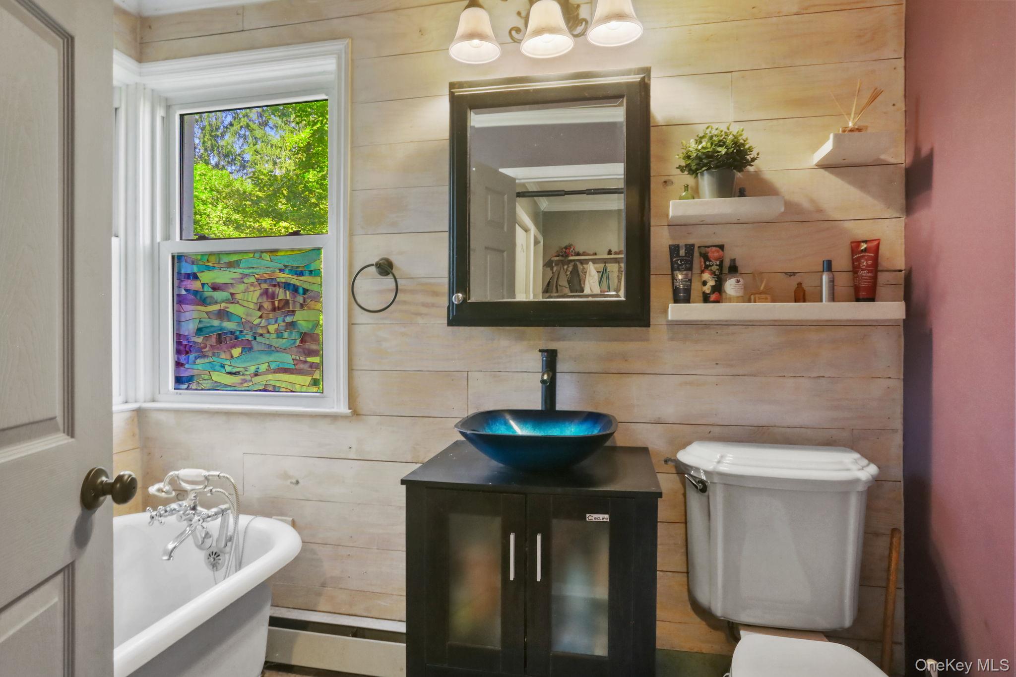 487 Chestnut Ridge Road Dover Plains, NY 12522 - Photo 20 of 41 a bathroom with a sink and a mirror