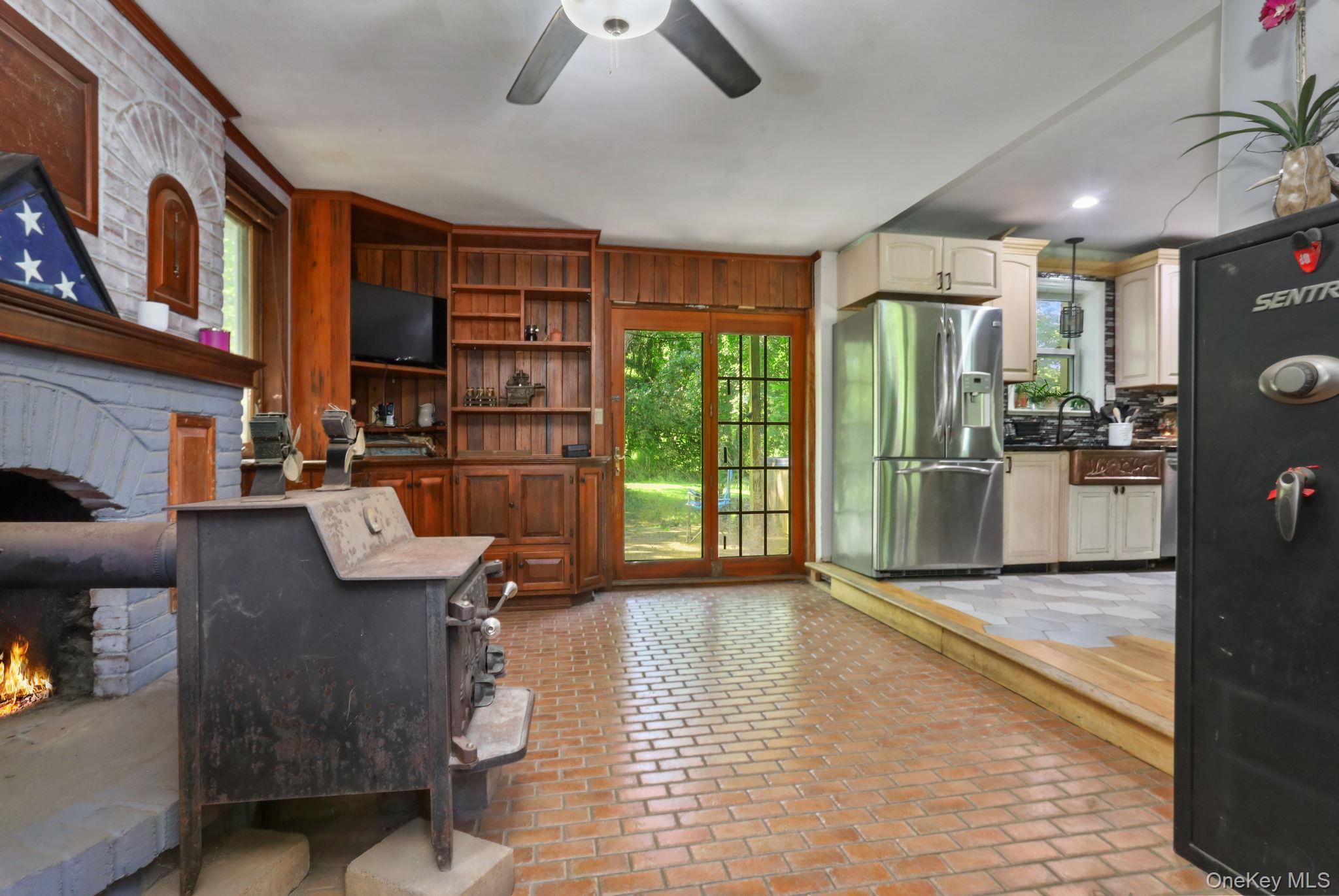 487 Chestnut Ridge Road Dover Plains, NY 12522 - Photo 24 of 41 a view of a livingroom with furniture and floor to ceiling window