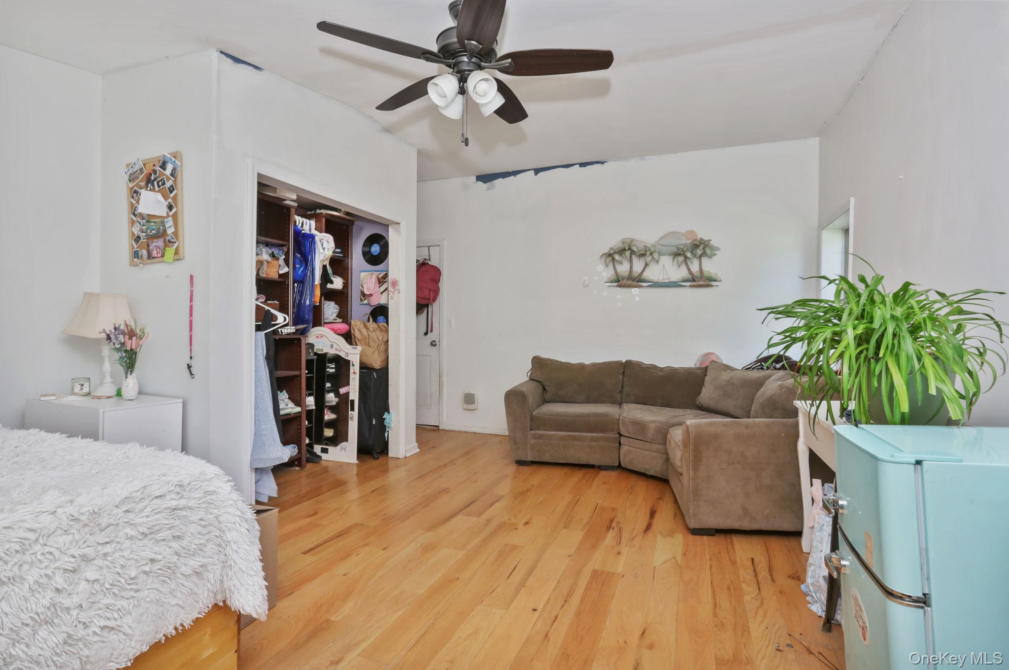 487 Chestnut Ridge Road Dover Plains, NY 12522 - Photo 33 of 41 a living room with furniture and a flat screen tv