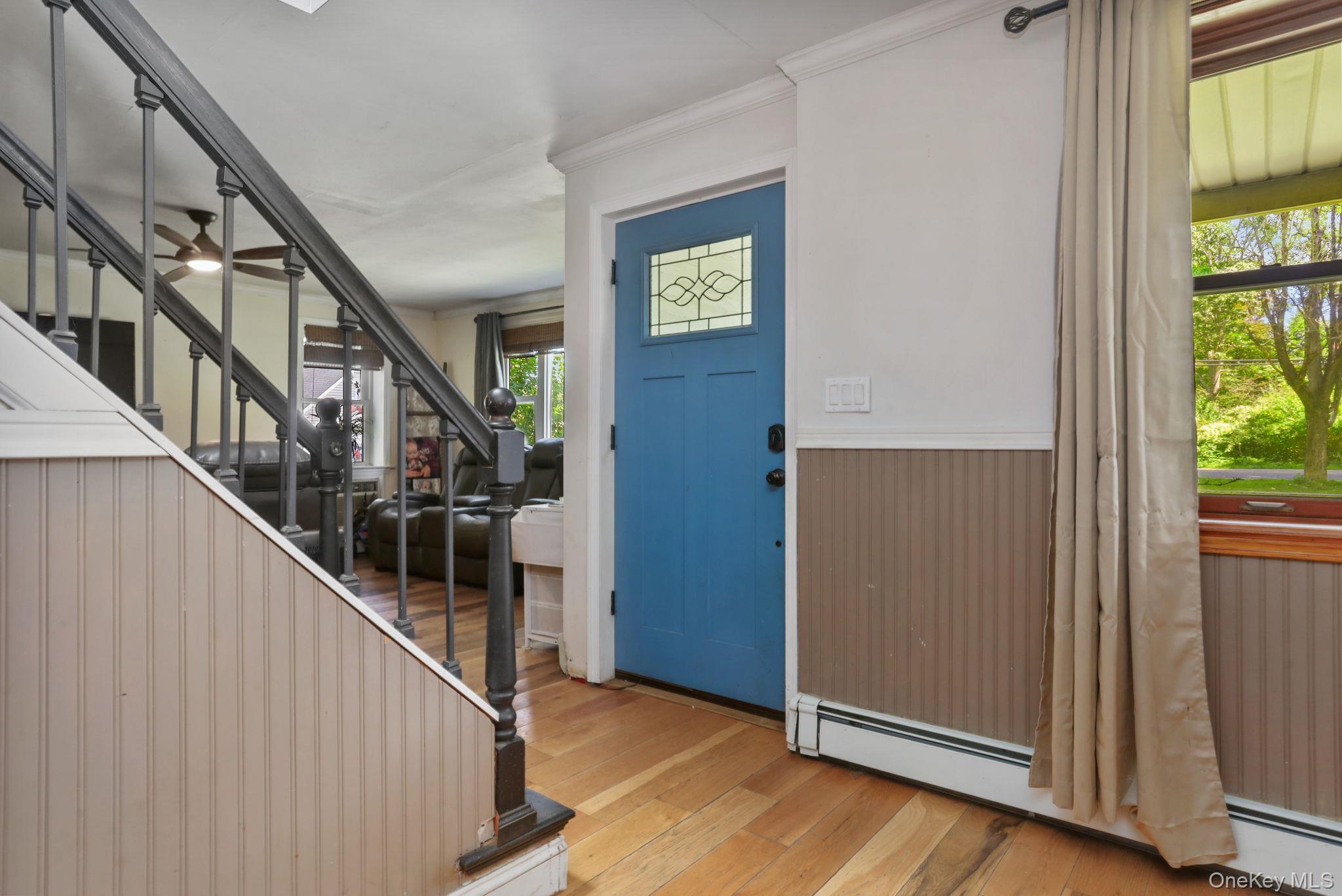 487 Chestnut Ridge Road Dover Plains, NY 12522 - Photo 8 of 41 a view of entryway with stairs and wooden floor