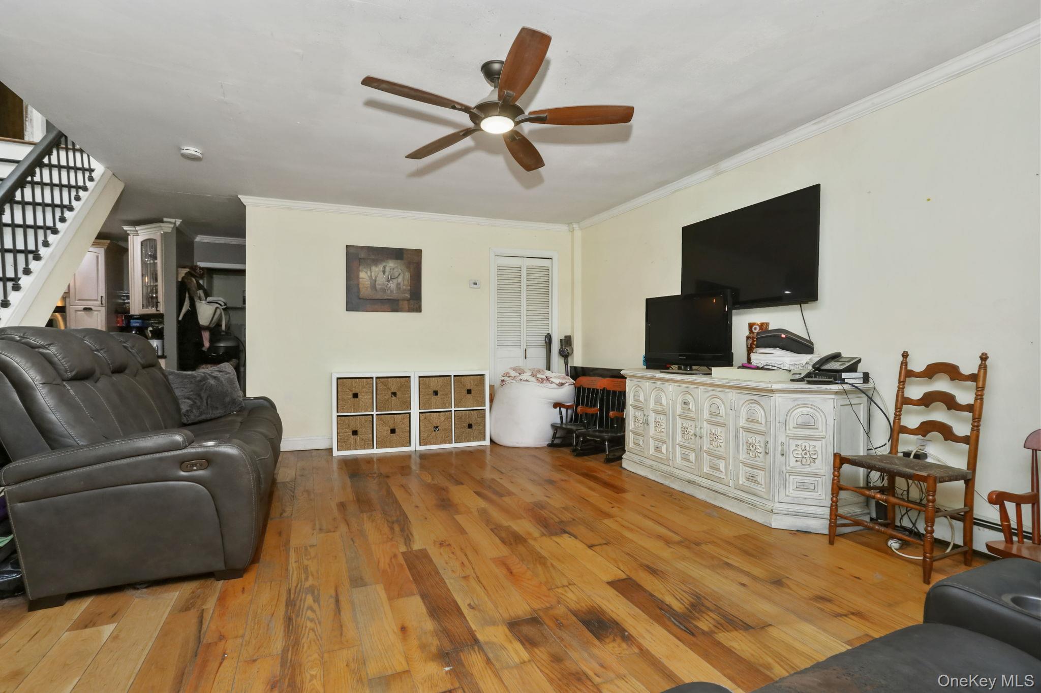 487 Chestnut Ridge Road Dover Plains, NY 12522 - Photo 10 of 41 a living room with furniture and a flat screen tv