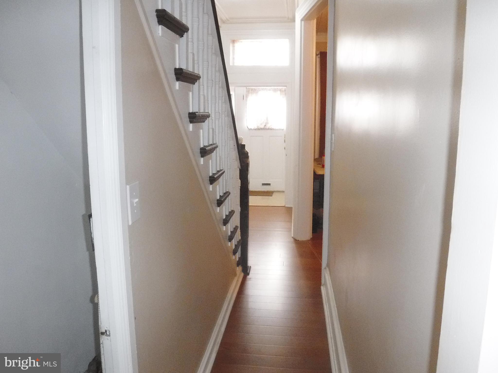 540 George Street Norristown, PA 19401 - Photo 23 of 53 a view of a hallway with wooden floor