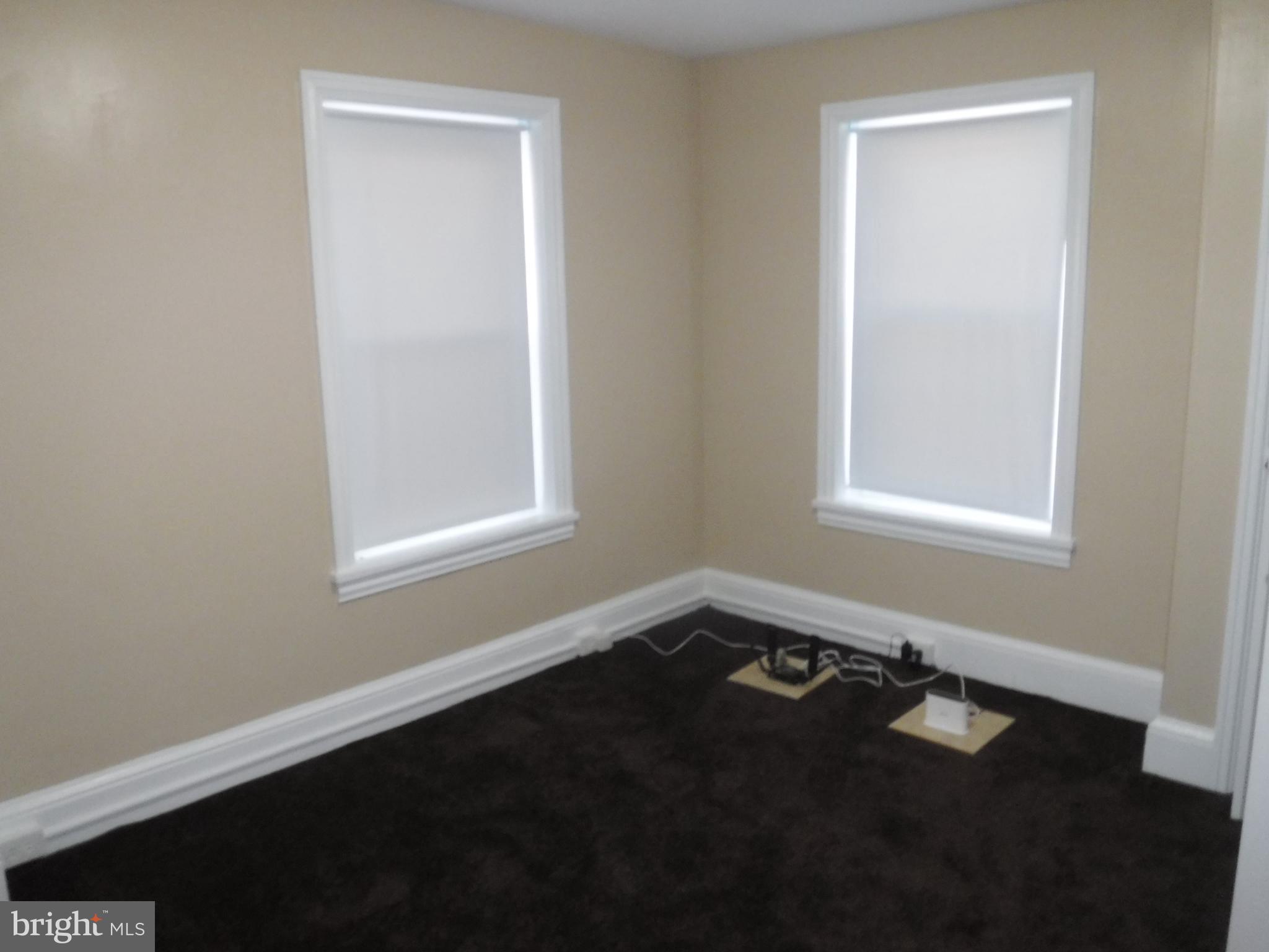 540 George Street Norristown, PA 19401 - Photo 46 of 53 a view of a small space with wooden floor and a window