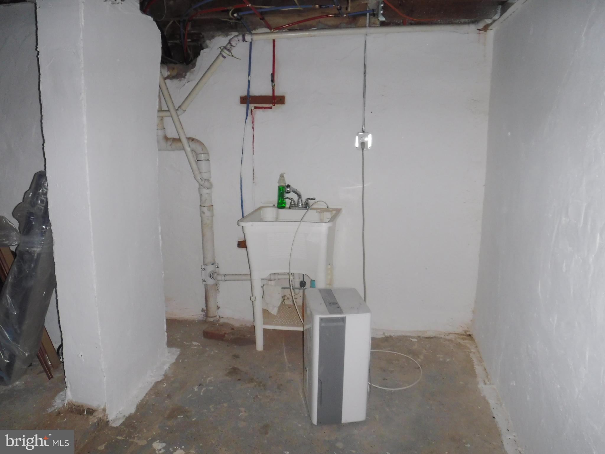 540 George Street Norristown, PA 19401 - Photo 53 of 53 a view of a room with racks on the wall