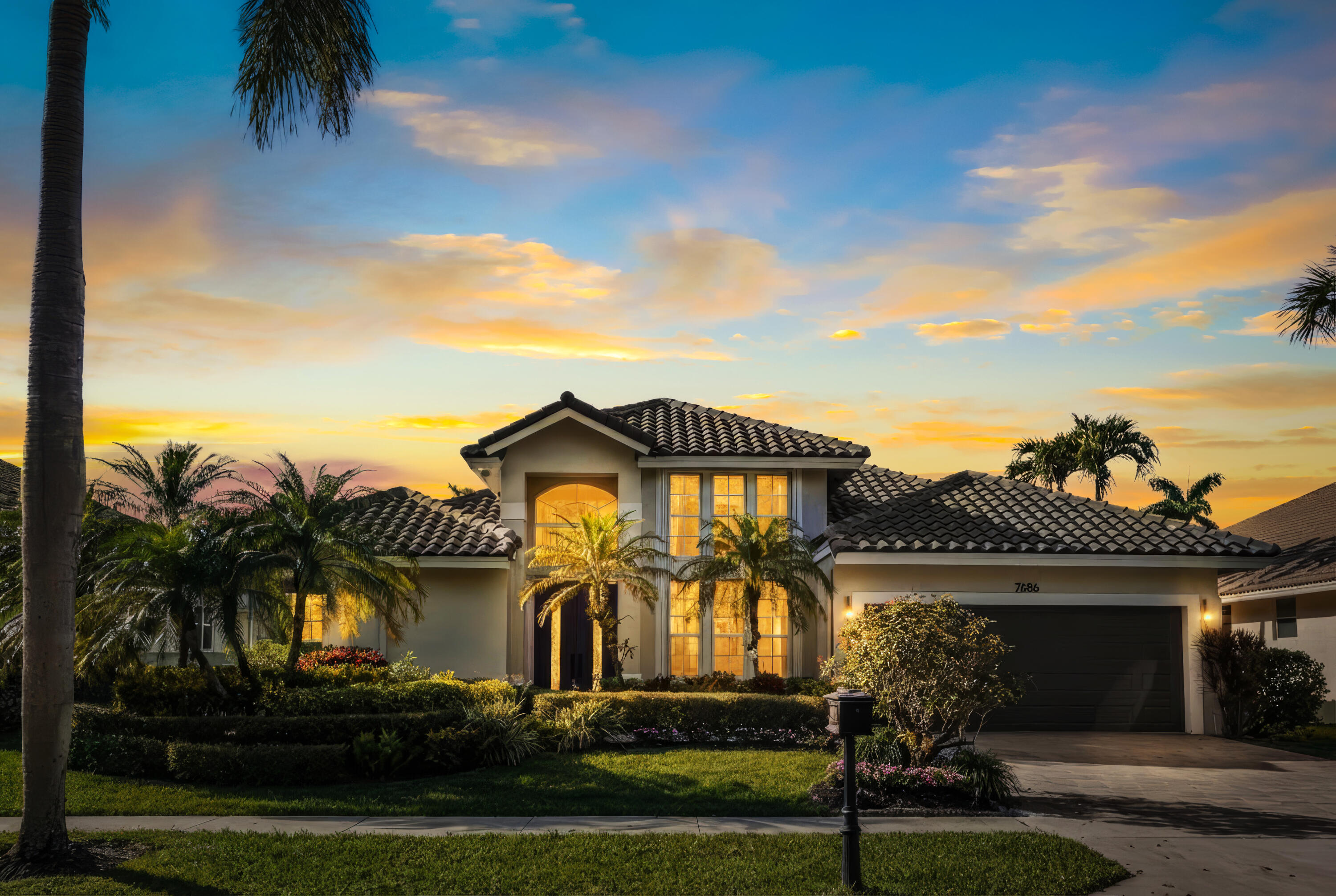 front view of a house with a yard
