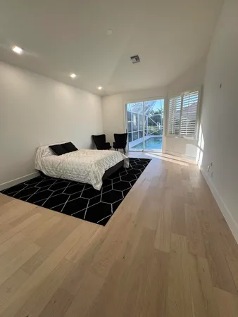 a view of a living room with a sink and chandelier