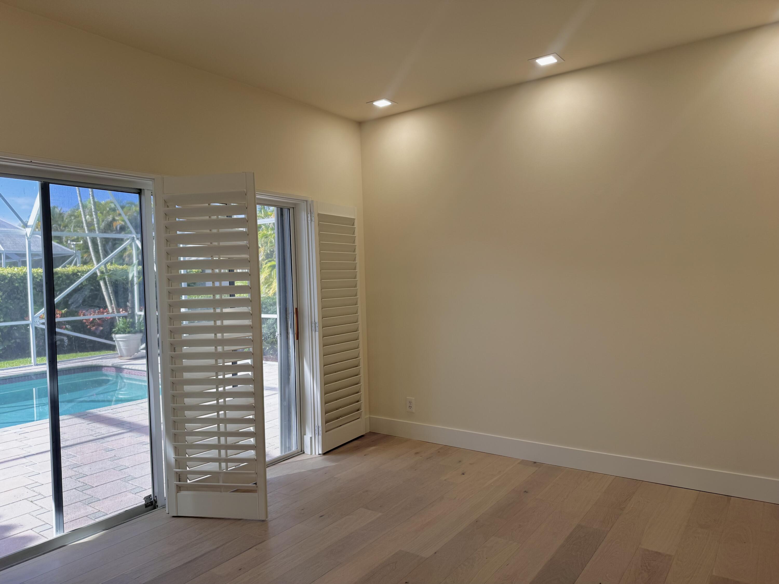 7686 La Corniche Circle Boca Raton, FL 33433 - Photo 25 of 35 an empty room with windows