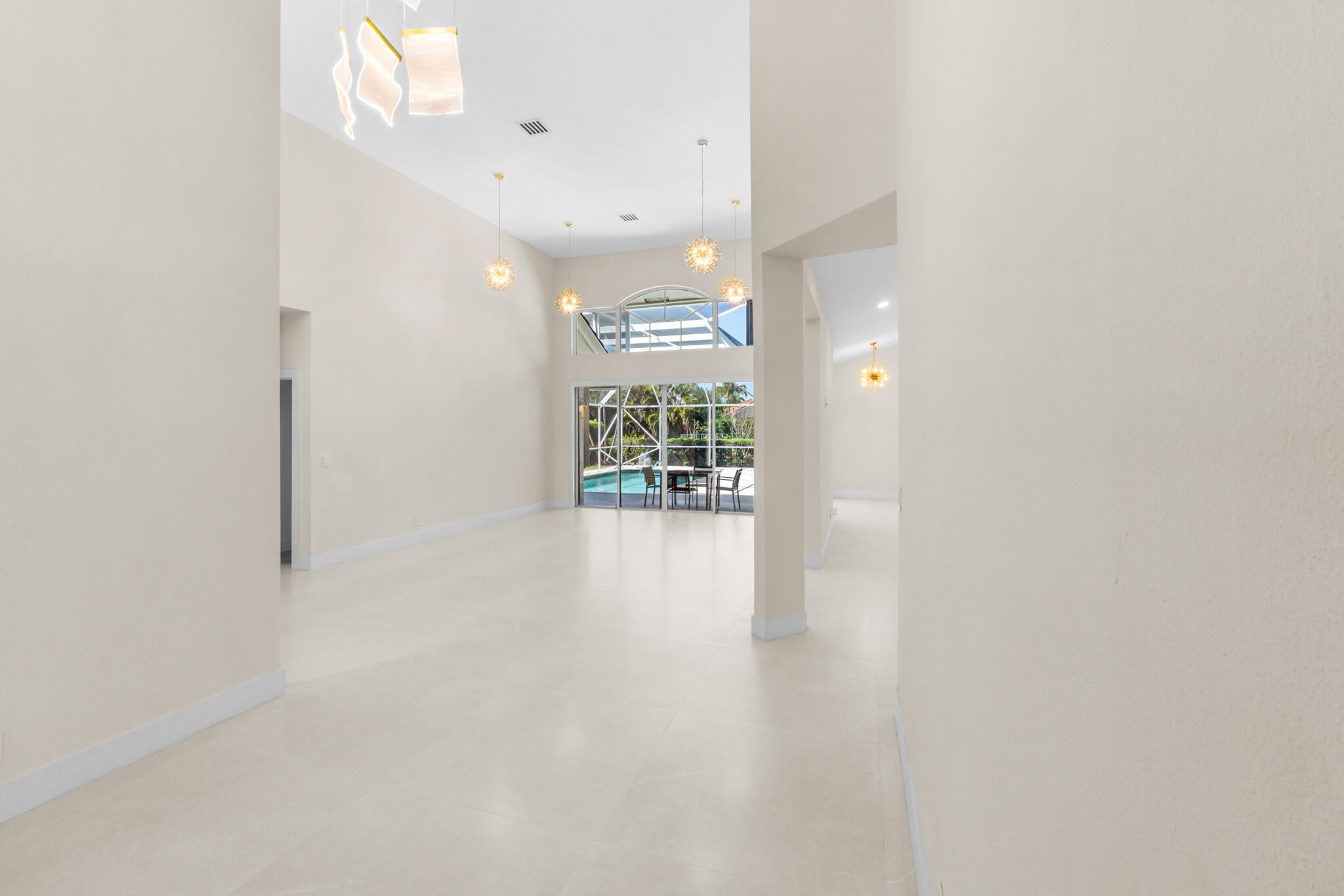 7686 La Corniche Circle Boca Raton, FL 33433 - Photo 3 of 35 a view of an empty room with a window