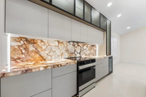 a living room with furniture fireplace and flat screen tv
