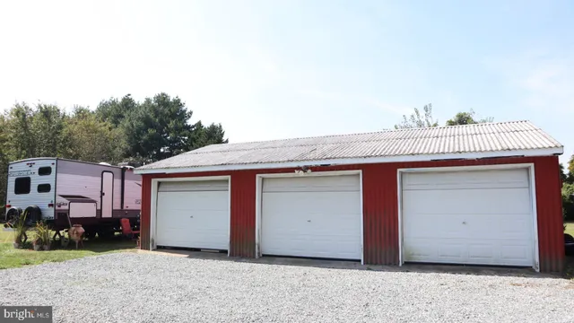 a view of a house with a tub and couches chair