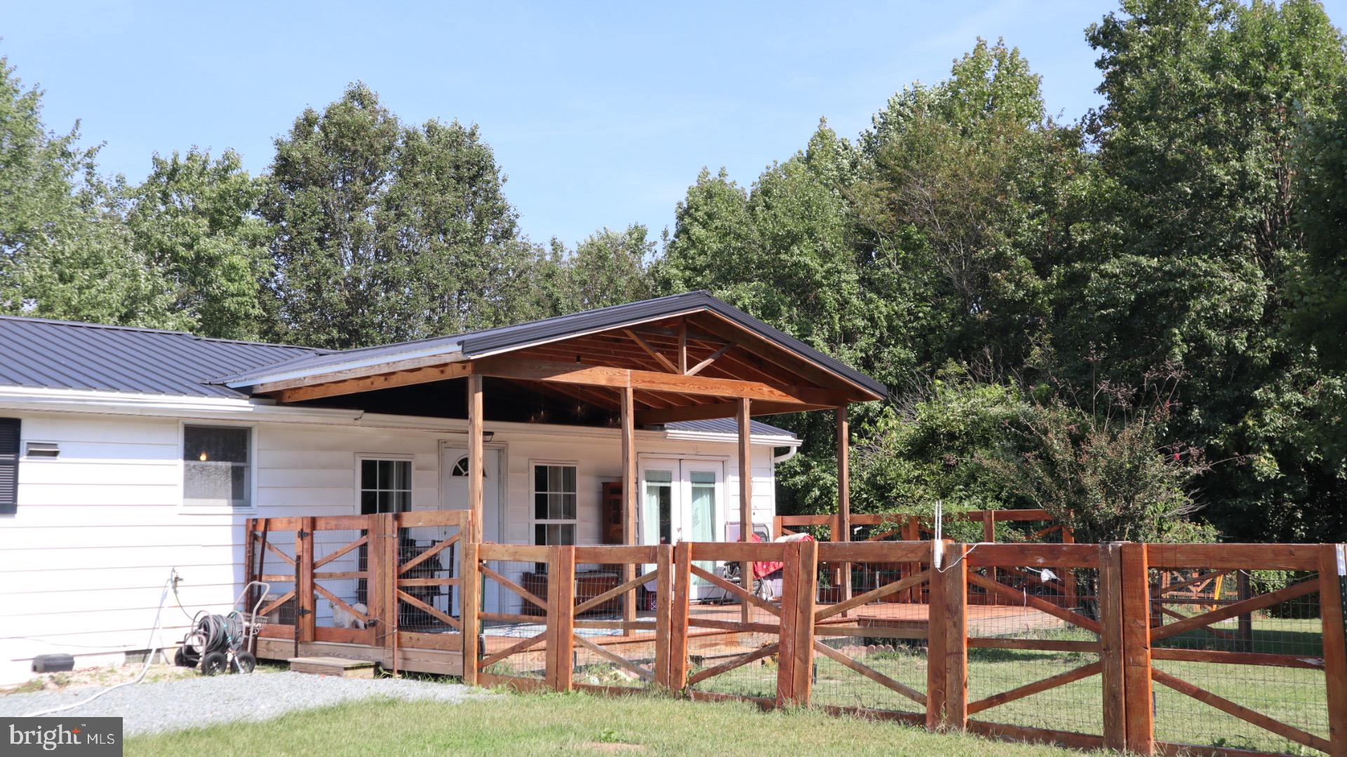 2010 McGinnes Road Chestertown, MD 21620 - Photo 6 of 19 a view of a chairs and tables in the patio