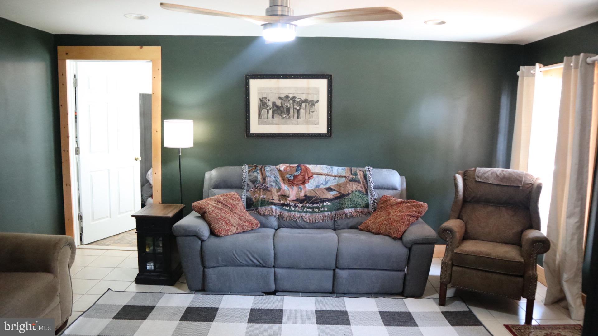 2010 McGinnes Road Chestertown, MD 21620 - Photo 8 of 19 a living room with furniture and a window