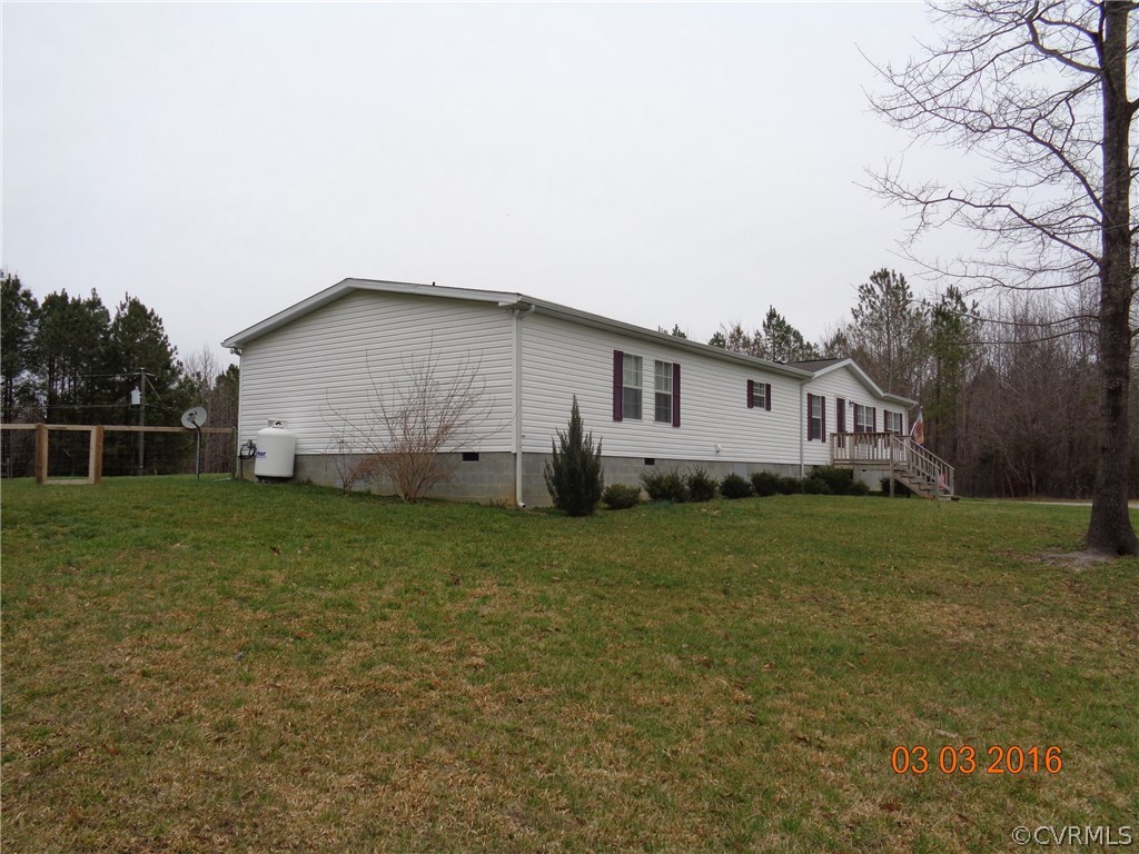 8612 Old Pine Road Ford, VA 23850 - Photo 3 of 27 a view of a house with a yard